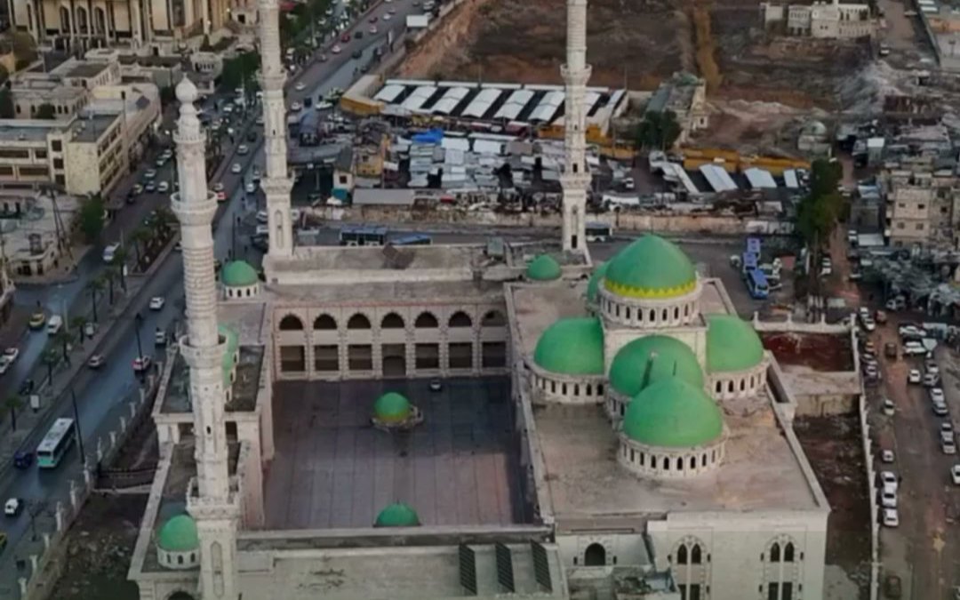 A mosque with green domes in Aleppo, seen from above