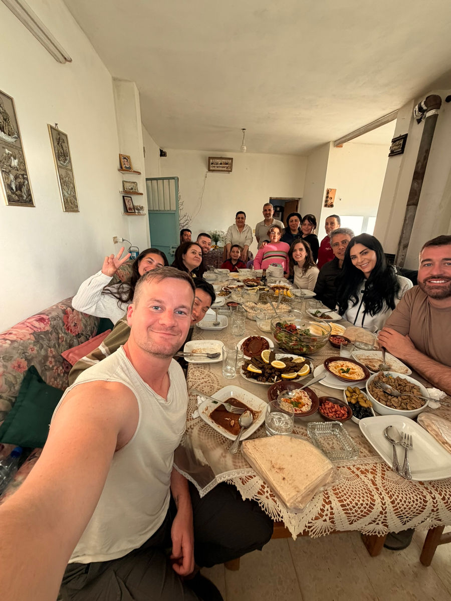 The group sharing a big Syrian lunch